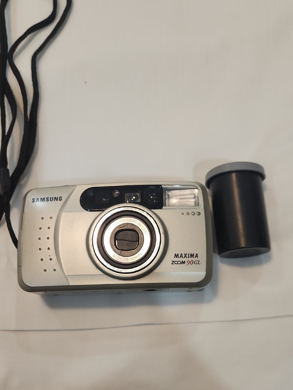 Samsung Silver Point-and-Shoot Film Camera with Black Film Canister
